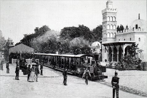 A Decauville locomotive carrying passengers in the Esplanade des Invalides, Paris