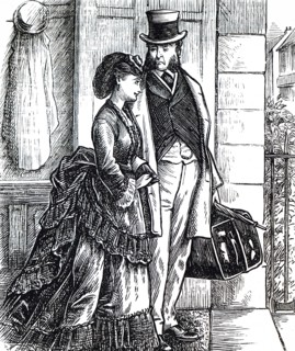 A father and daughter walking together toward the train station