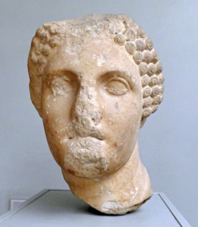 Head from a colossal statue of a woman wearing a sakkos (cap)