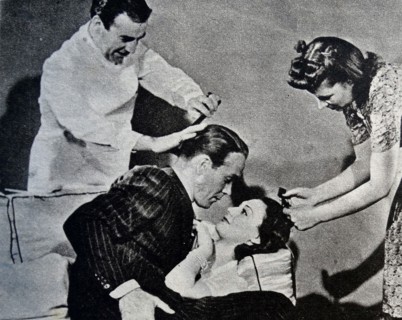 Gerry Fairbanks and Joan Collins on a film set