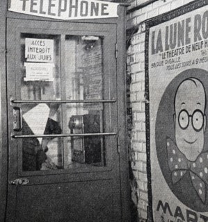 Telephone box in France with a Nazi German sign banning Jews from using it during World War II