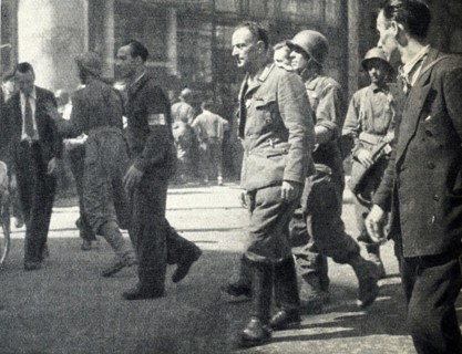 Captured German soldiers on the streets of Paris at the end of World War IICaptured German soldiers on the streets of Paris at the end of World War II