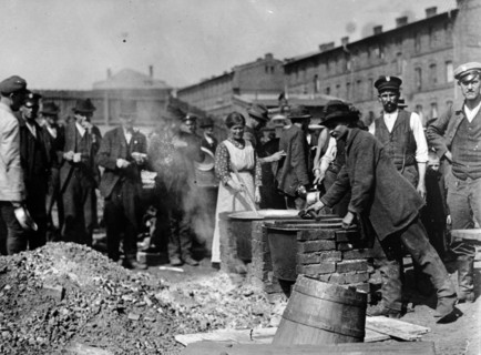 Kitchen for Polish refugees, outside of a school building barracks in 1919