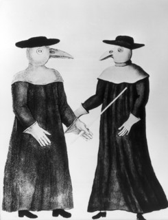 medical science in former times: Pest doctors in typical habit , 17th cent. 
contemp. Illustr.