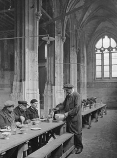 France Haute-Normandie Rouen: Dining hall for the unemployed in the old church of Rouen - 1929 - Photographer: Alfred Eisenstaedt - Vintage property of ullstein bild
