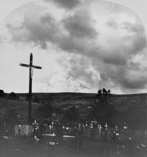 French overseas department Martinique, view from a graveyard to the smoke column three miles high above the Mount Pelee after the volcanic eruption of Mount Pelee, May 1902
