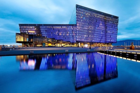 Illuminated Harpa Concert Hall at dusk