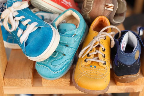 Children's shoes in a shelf