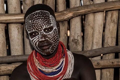 Young woman with painted face