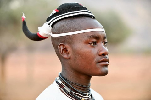 Young Himba man with traditional hairstyle