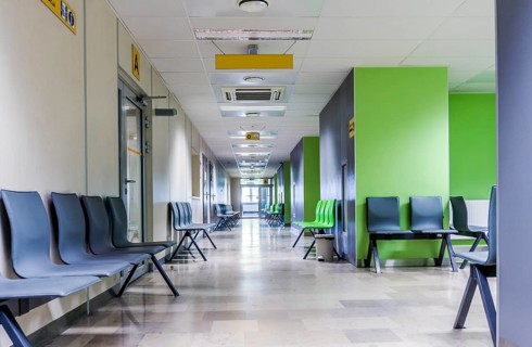 Corridor with chairs for patients in a modern hospital