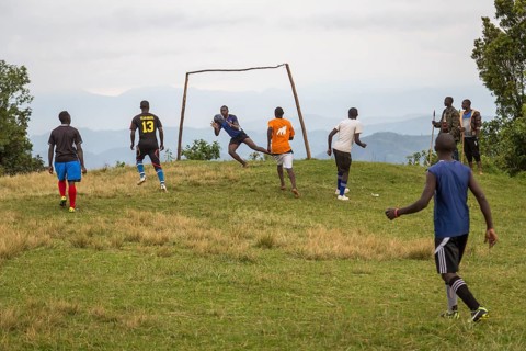 Teenagers at football match