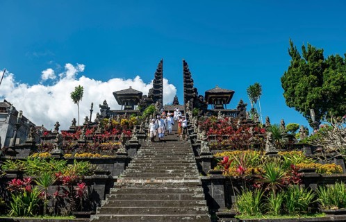 Devout Balinese descend stairs