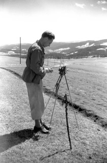 Man is photographing the landscape around 1950 in Freiburg
