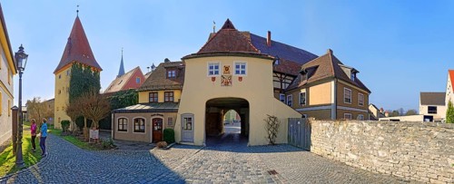 Old city wall with gate