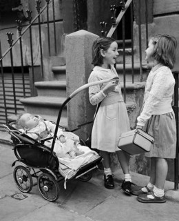 Two girls with baby