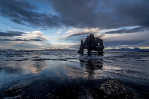 Cloudy atmosphere with reflection at Hvitserkur