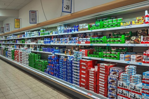 Shelf with dairy products in supermarkets