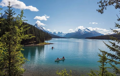 Canoeist on Maligne Lake