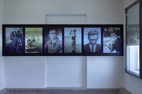 Photos in the exhibition room of the former laundry