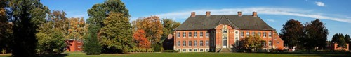 Manor house Borstel Castle with castle park in autumn