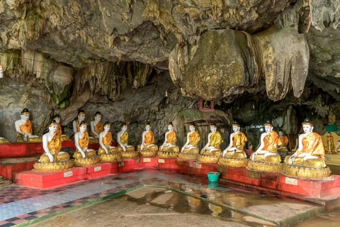 Sitting Buddha statues in the Bayin Nyi Cave Temple