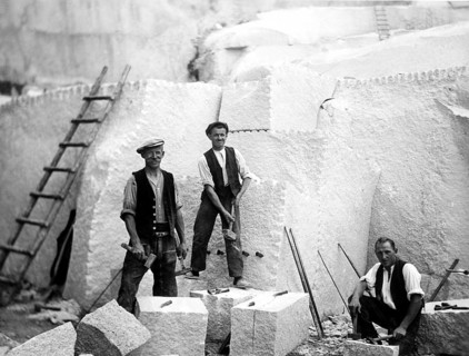 Three men working in the quarry