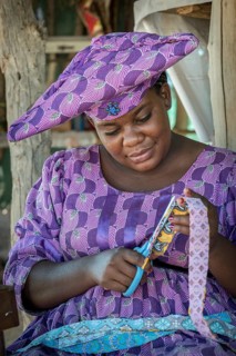 Native Herero woman with typical headgear and clothes