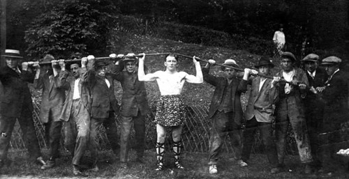 The strongest man in the world bends an iron rod