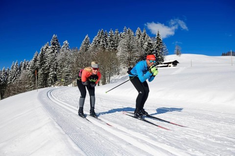 Olympic silver medalist Tobi Angerer with his wife Romy on the cross-country ski trail of Winklmoos-Alm