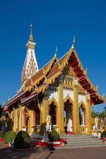 Bot in front of the Chedi of Wat Phra That Phanom