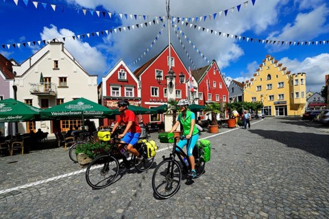 Cyclists in the old town of Abensberg