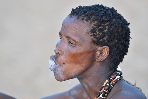 Old San woman smoking