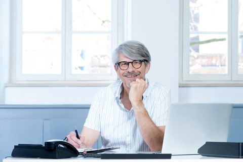 Man working at the laptop in the office