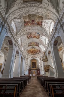 Interior view with chancel and ceiling frescoes and stucco