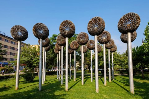 Flower sculptures from ammunition and weapons in the municipal park