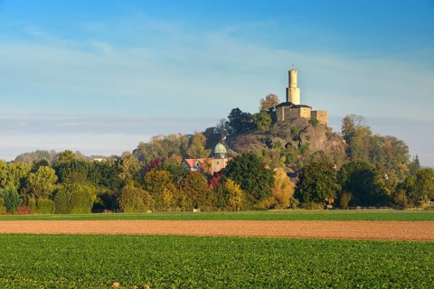 Felsburg castle above the city of Felsberg in autumn