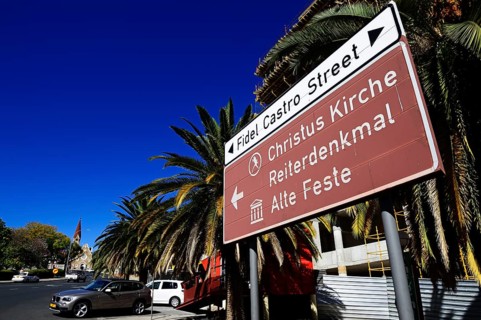 Sign Christ Church and Fidel Castro street with a view of the church
