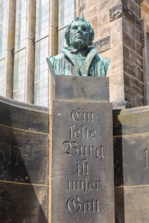 Luther fountain at the cathedral with the inscription A solid castle is our god