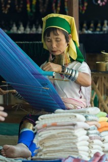 Padaung or long neck woman weaving