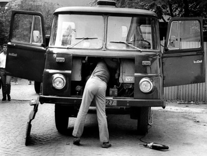 Man repairing trucks ca. 1970s