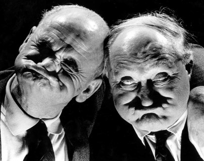 Two old men cutting grimaces