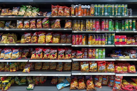 Snacks in a supermarket shelf