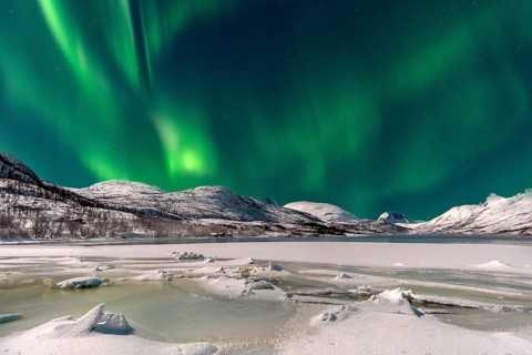 Ice landscape with northern lights