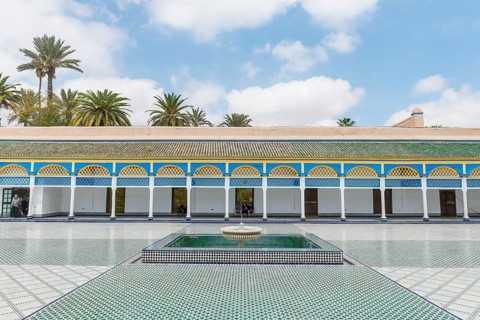 Ornate courtyard with columns and fountain