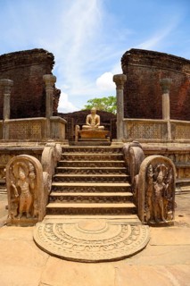Ruin of a temple with moonstone and Buddha statue