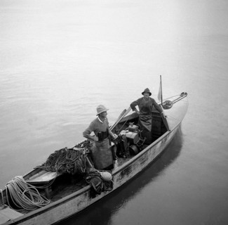 Men fishing on a fishing boat