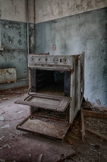 Kitchen stove in destroyed room