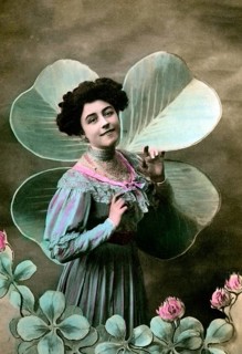 Woman in front of a four-leaf clover