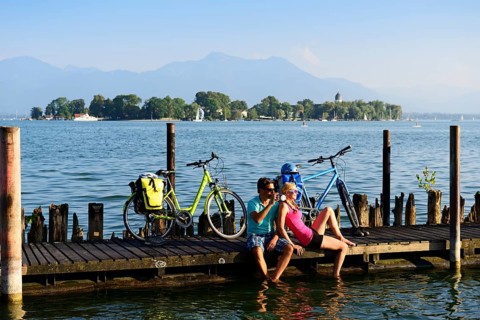 Cyclists resting on jetty